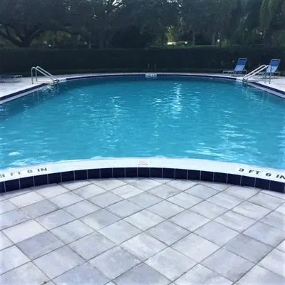 A pool with a lot of water in it